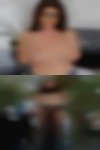 Naked woman putting pussy down